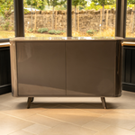Modern sideboard with two doors in a high gloss finish.