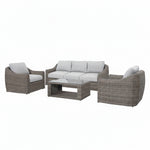 Outdoor furniture set with wicker chairs and sofa on a white background