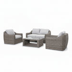 Outdoor furniture set with wicker chairs and sofa on a white background