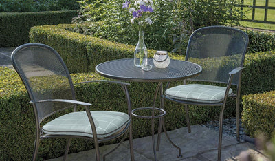 How do I repair scratches and scuffs on my metal garden furniture?