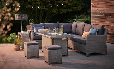 Casual dining garden set on patio at night