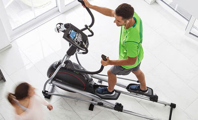Man using a cross trainer