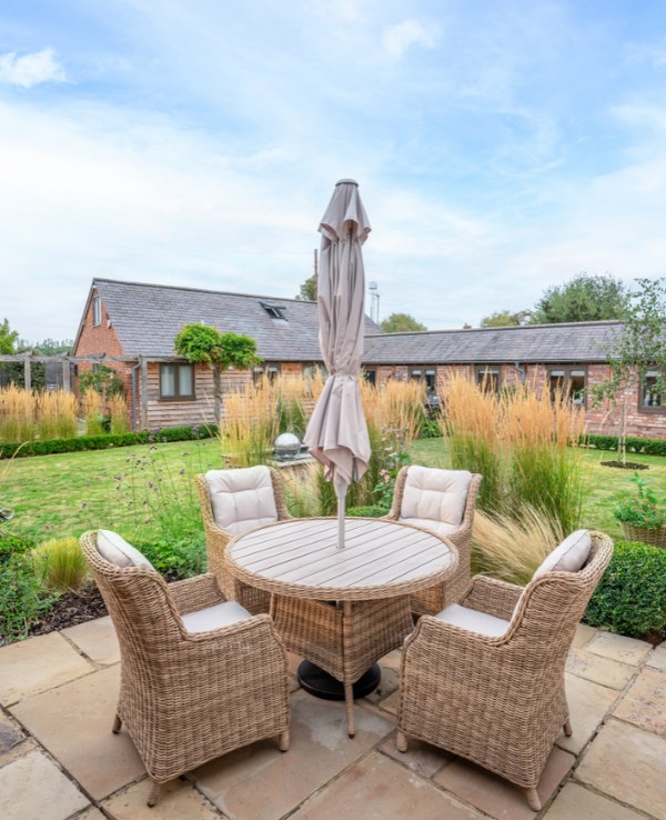 Hazel 4 Seat Wicker Dining Set with Round Table Includes Parasol & Base