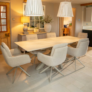 Oslo 6 Seat Indoor Dining Set with ceramic extendable table and 6 auto swivel dining chairs