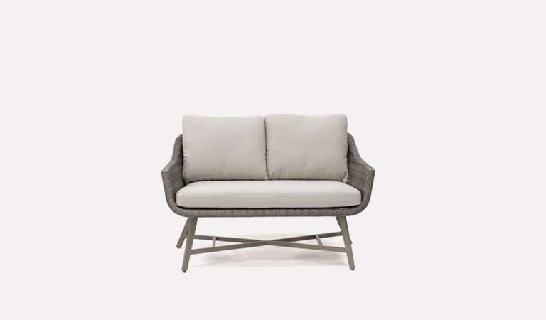 The LaMode 2 Seater Sofa from KETTLER's Elegance Garden furniture range on a grey background.
