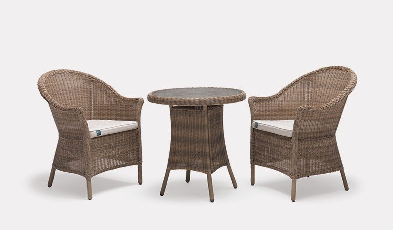 RHS Harlow Carr 2 Seater Bistro Set from the RHS by KETTLER Garden furniture range on a grey background.