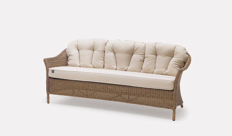 RHS Harlow Carr 3 Seater Sofa with cushions from the RHS by KETTLER garden furniture range on a grey background.