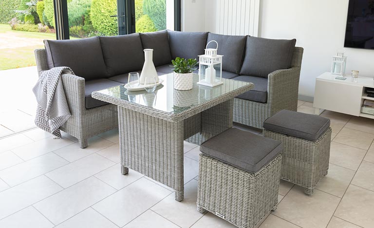 Palma Mini Set in White Wash finish with Glass Top Table from KETTLER's Casual Dining garden furniture range in a conservatory