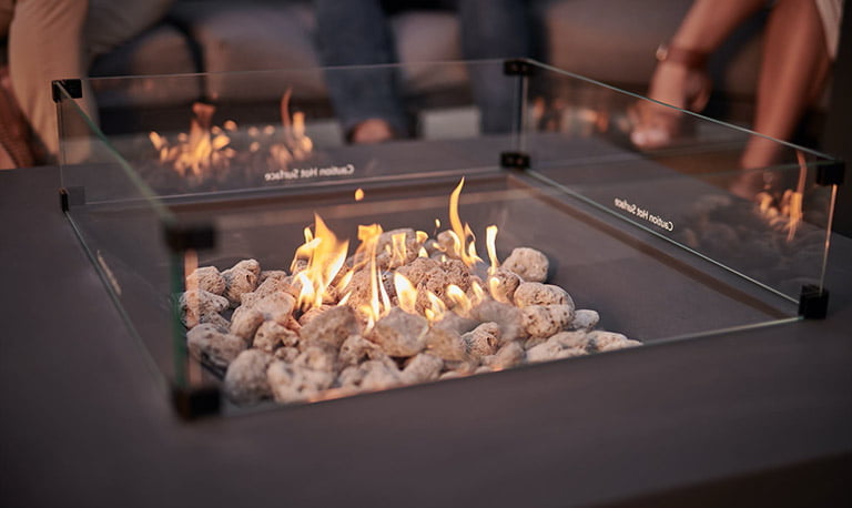 Kettler fire pit with flames