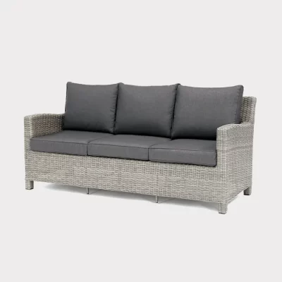 Palma 3 seater sofa in white wash wicker with grey cushions on a white background