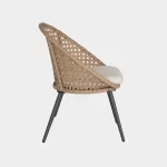 Boho balcony lounge chair side view on a white background