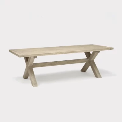 cora 240 x 100cm crossed leg wooden dining table on a plain white background