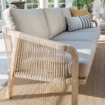Detail image of cora rope 3 seat sofa in a conservatory