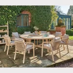 Cora rope 8 seat dining set made from fsc wood on a garden terrace in the sunshine