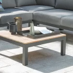 Elba tray in grey on a coffee table in the sunshine