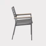 Side view of Elba dining chair in grey on a plain white background