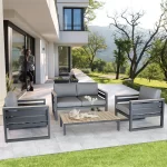 elba grand sofa set in grey on a modern garden patio in the evening sun