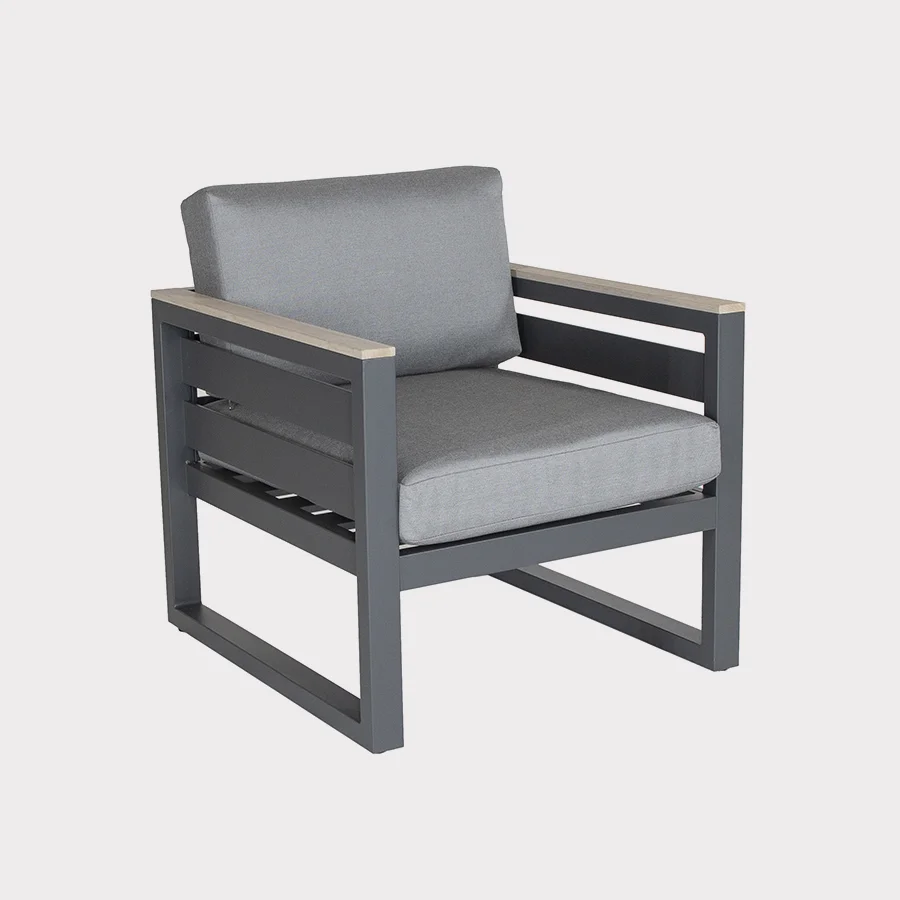 elba grand low lounge chair in grey on a plain white background