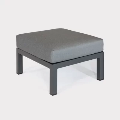 elba low lounge single foot stool in grey on a plain white background