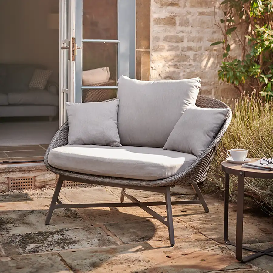 LaMode comfort chair with cushions on a garden patio in the sunshine