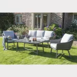 LaMode lounge set with 3 seater sofa on the grass in the garden in the sunshine