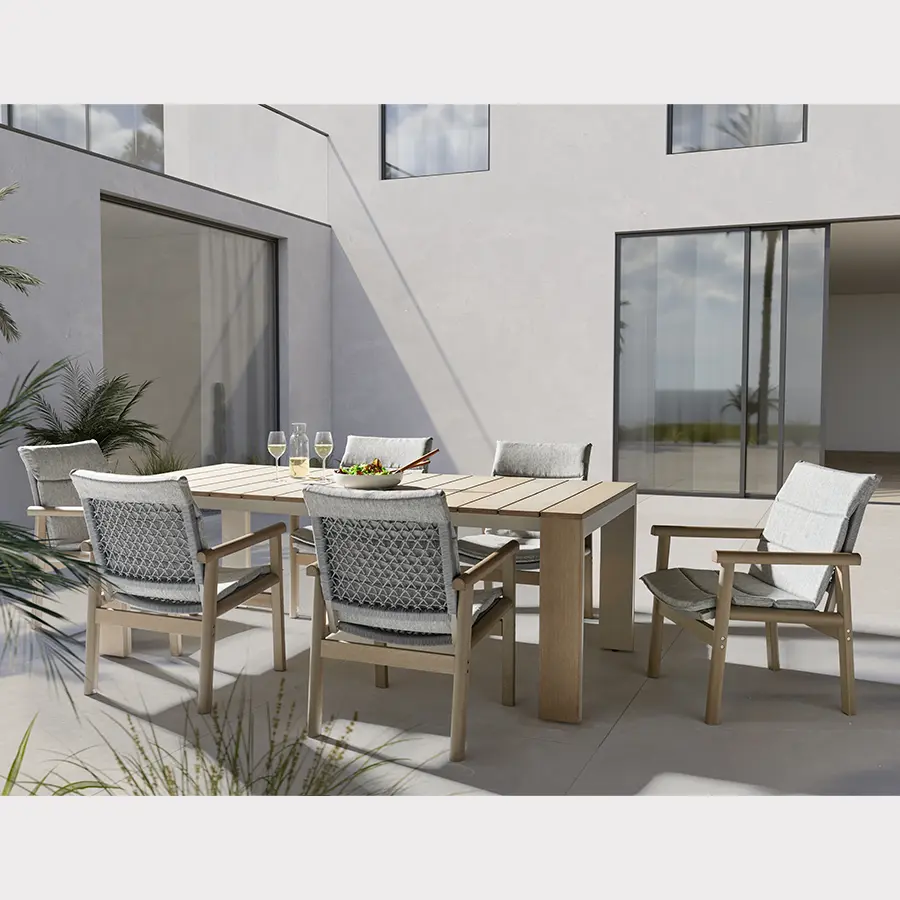 6 seater Mali dining set on modern patio in the sunshine