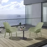 Café Modena Lounge chairs in sage on a balcony overlooking the sea