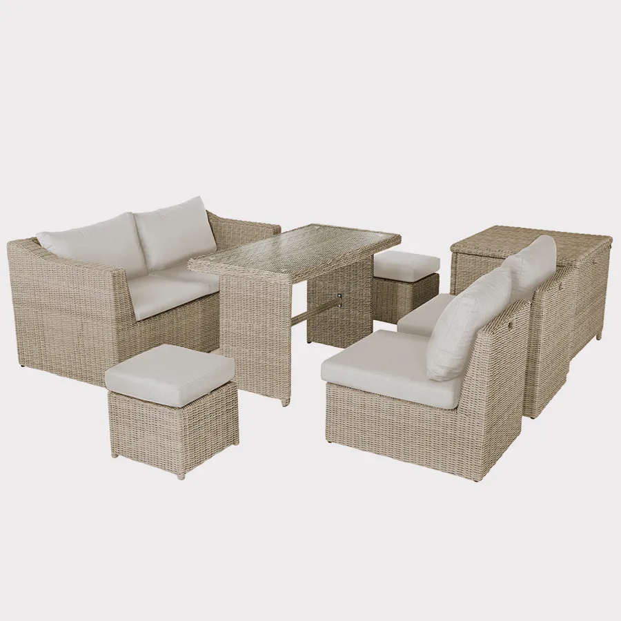 Palma compact corner set in oyster wicker with stone cushions on a plain white background