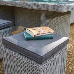 Closeup of Palma stool cushion with book