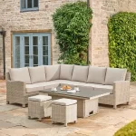 Palma corner set in the garden with palma SQ height adjustable table in the low position