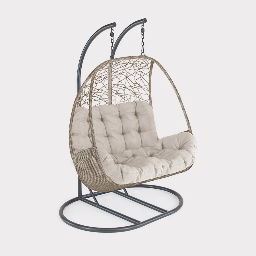 Palma double cocoon swinging seat in oyster wicker on a plain white background