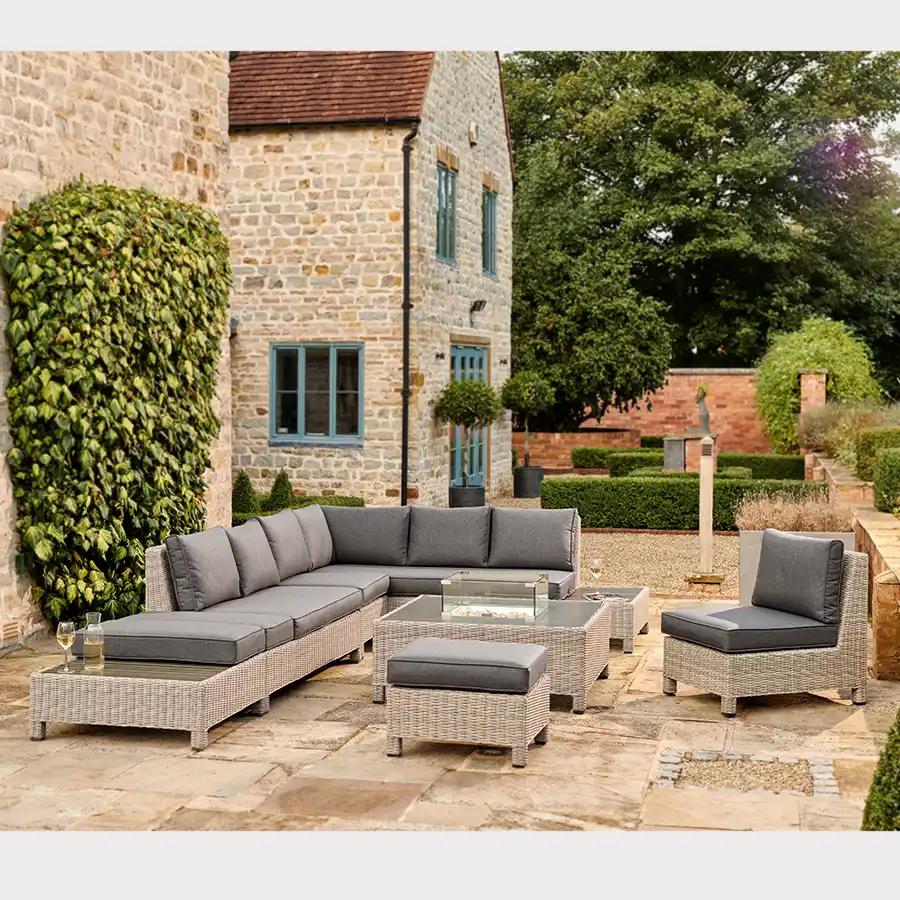 white wash palma low lounge set with fire pit table on a garden patio