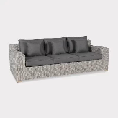 Palma luxe 3 seater sofa in white wash wicker with grey cushions on a plain white background