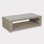 Palma luxe coffee table in oyster wicker with glass top on a plain white background