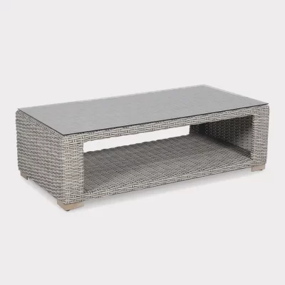 Palma luxe coffee table in white wash wicker with glass top on a plain white background