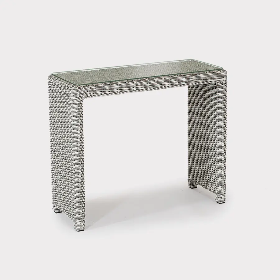 Palma side table in white wash wicker on a plain white background