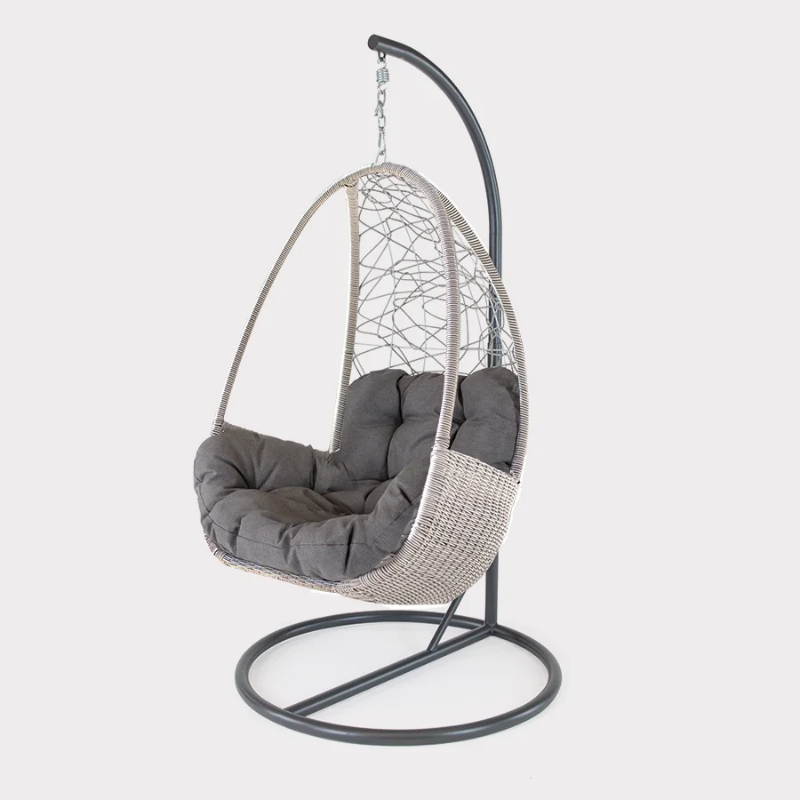 Palma single cocoon swinging seat in white wash wicker on a plain white background