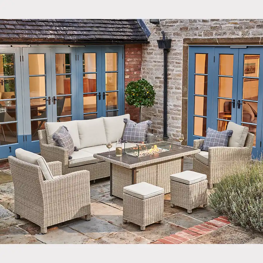 Palma fire pit table with sofa set on a garden patio