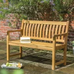 Wooden garden bench on pation