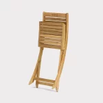 Folded RHS Chelsea bistro chair on a plain white background