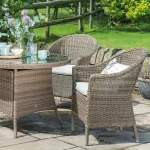 Harlow Carr 4 seat dining set on a garden terrace in the sunshine