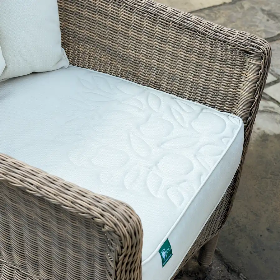 RHS Harlow Carr lounge chair with cushion detail on a garden patio