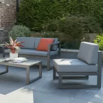 Close up of Versa sofa set on a garden patio in the sun shine