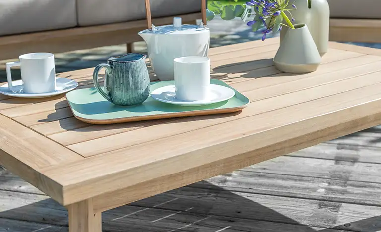 Detail of Adelaide wooden coffee table with tea set