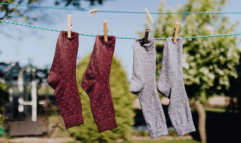 Socks on a washing line in the garden