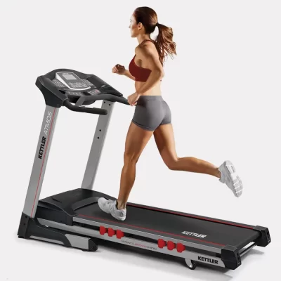 woman running on atmos treadmill