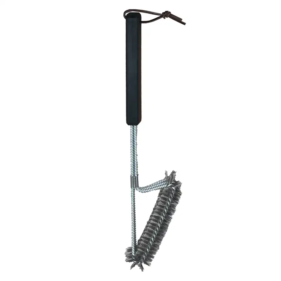 End view of small grill brush on a white background