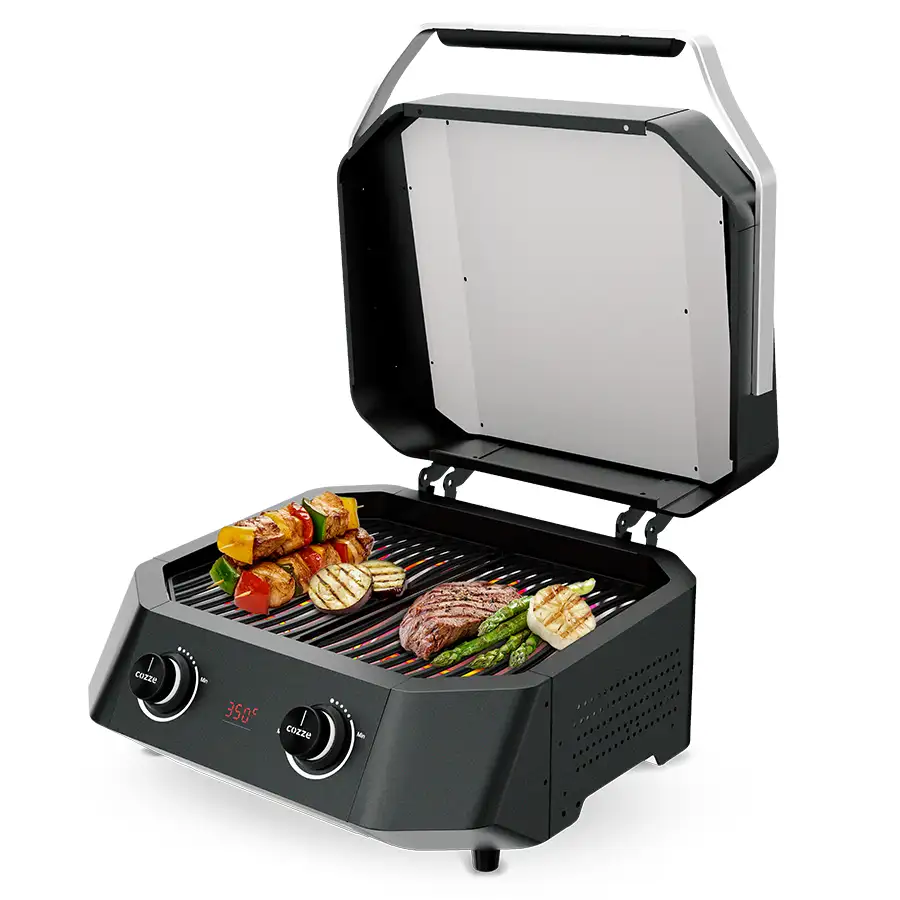 Cozze electric grill E500 with lid open and BBQ food cooking inside