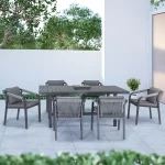 Corus 6 seat dining set on a grey marble garden terrace