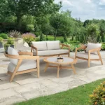 Kubu Lounge Set with 2 seat sofa in a beautiful garden on a summers day